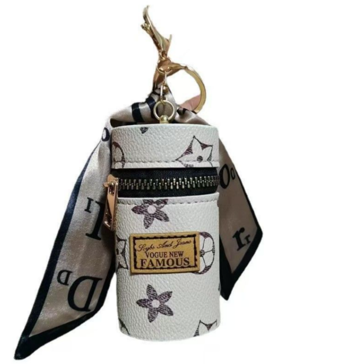 オフホワイトの花柄モノグラム円筒形ミニリップスティックケース - Monogram Keychain Leather のレビューと価格